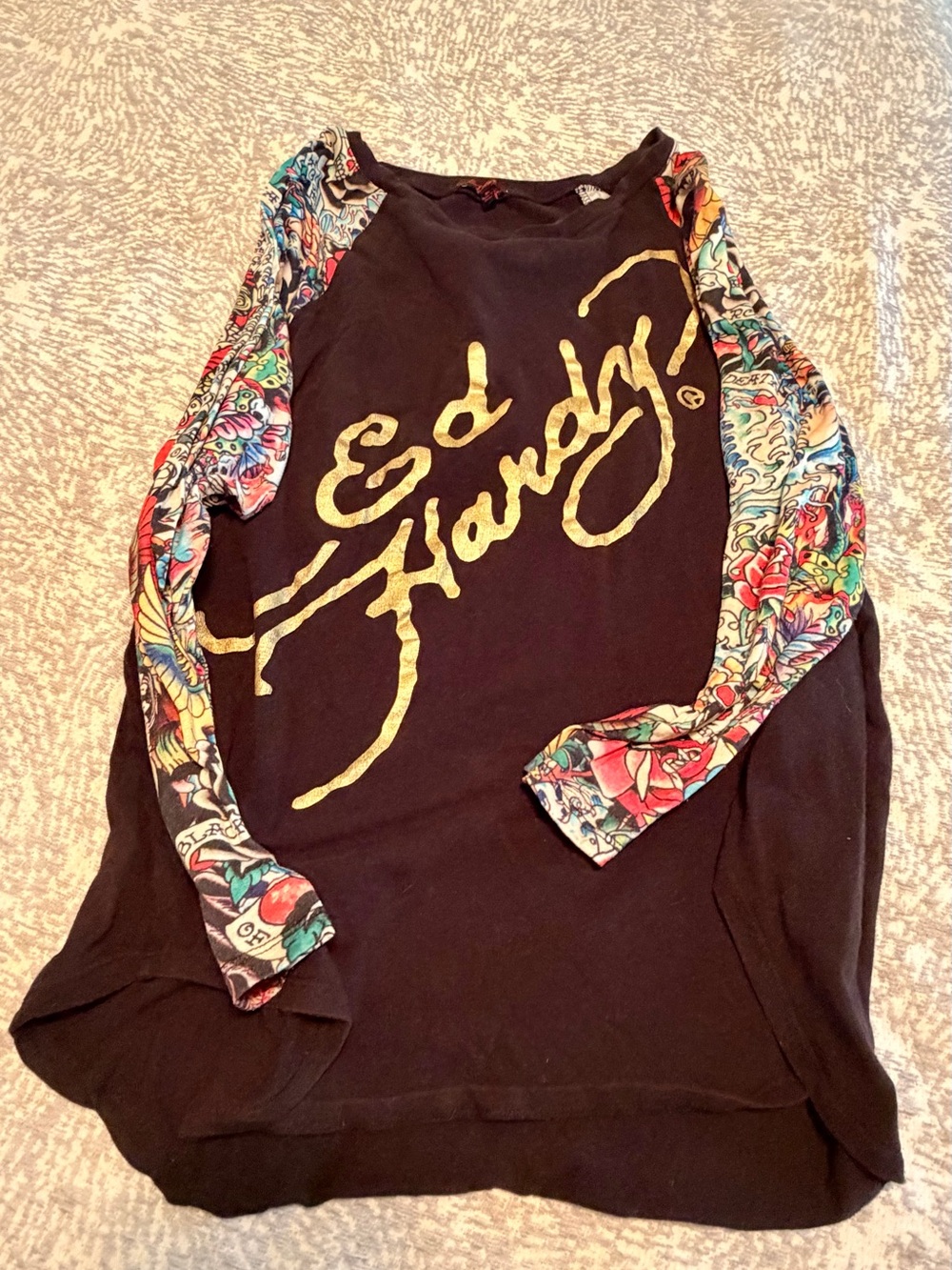 Ed Hardy woman’s Black Long Sleeve Graphic Top with Tattoo-Print Sleeves